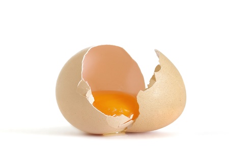 Broken egg isolated in white