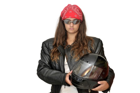 Young girl biker with helmet isolated in whiteの写真素材