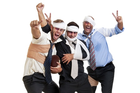 Group of injured businessmen after a rugby game