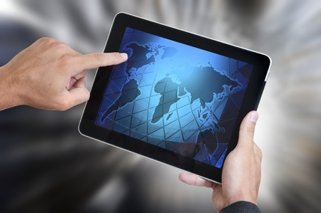 Hands holding a tablet or a Padの写真素材