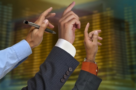 Businessmen hands in stock exchangeの写真素材