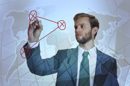 Young businessman with red marker