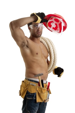 Strong build construction worker isolated in whiteの写真素材