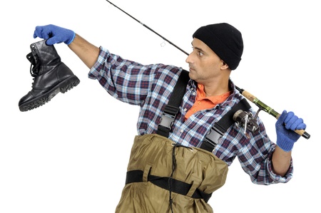Fisherman with fishing rod and old boot isolated in white