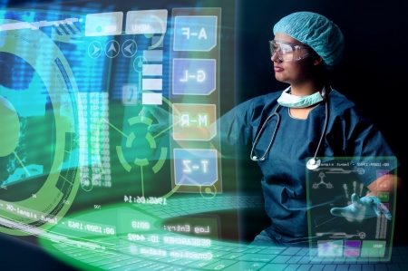 Doctor in uniform with X-rays and digital  screens and keyboardの写真素材
