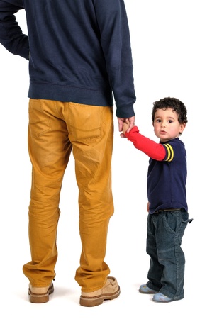 Young boy hand holding his fatherの写真素材