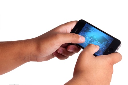 Detail of hands plaing with a cellphone 
