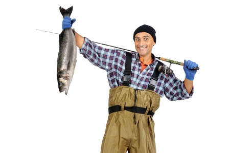 Fisherman posing with the catch isolated in white