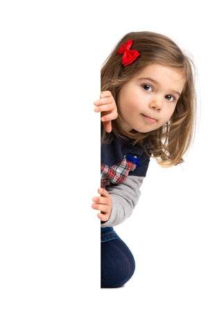 Young girl posing with a white boardの写真素材