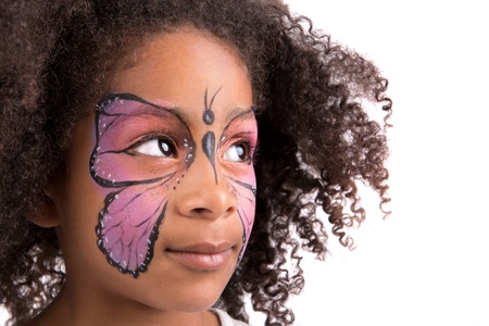 Beautiful young girl with face painted like a butterflyの写真素材
