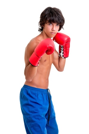 Young fighter posing with boxing glovesの写真素材