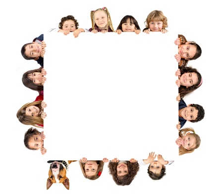 Group of children and a dog with a white board isolated in whiteの写真素材