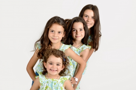 Group of young girls posing isolatedの写真素材