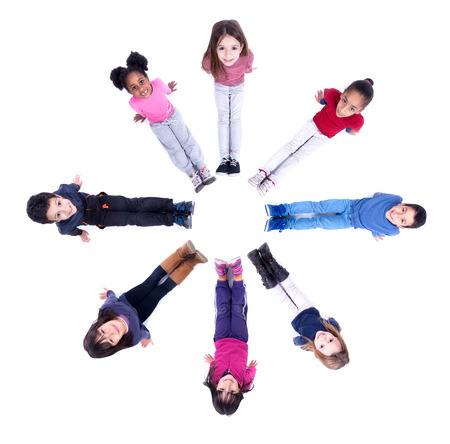 Group of children posing isolated in whiteの写真素材