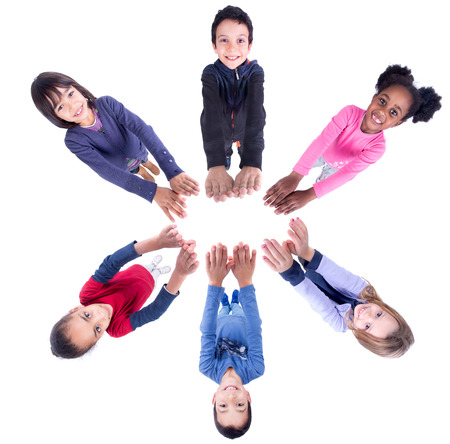 Group of children posing isolated in whiteの写真素材