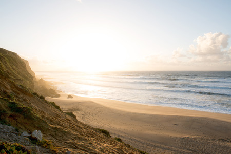 Meco beach in Portugal by sunsetの写真素材