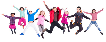 Group of children jumpng isolated in whiteの写真素材