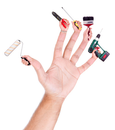Hand with several hands with construction tools as fingersの写真素材