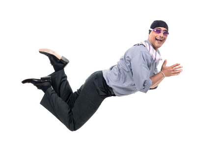 Businessman with swimming gear diving isolated in whiteの写真素材
