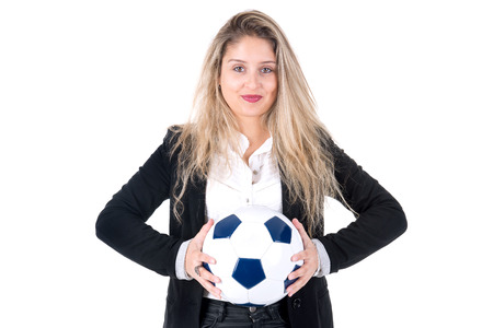 Businesswoman posing with soccer ballの写真素材