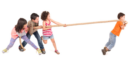 Group of children in a rope-pulling contest against just one kid