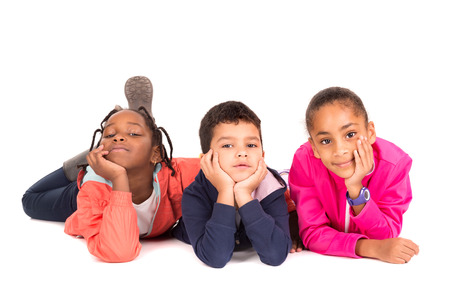 Group of children posing isolated in whiteの写真素材