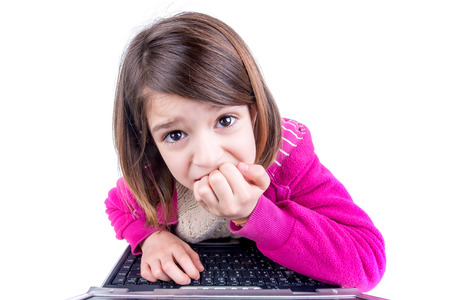 Desperate young girl with laptop computer