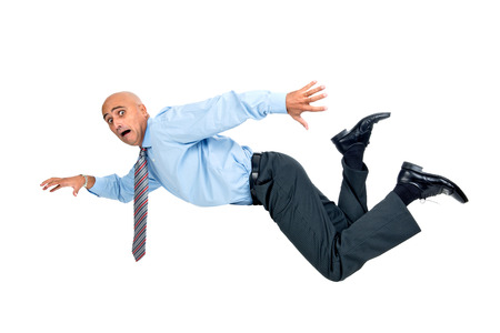 Happy businessman jumping high isolated in white