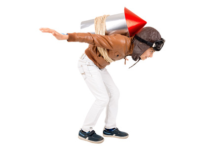 Young boy with home made rocket ready for adventure