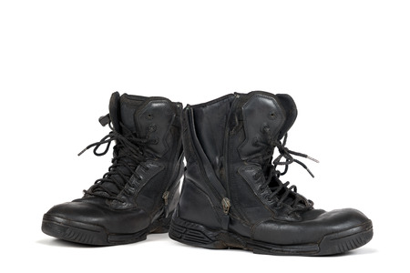 Pair of army boots isolated in white
