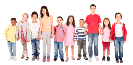Large group of children posing isolated in whiteの写真素材