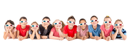 Group of children with 3d glasses isolated in whiteの写真素材
