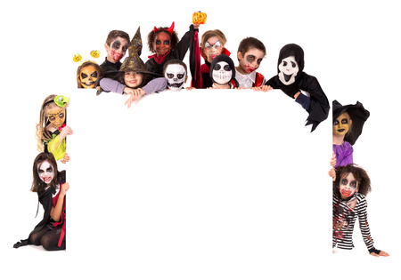 Group of kids with face-paint and Halloween costumesの写真素材