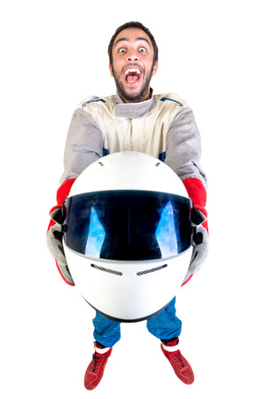 Racing driver posing with helmet isolated in whiteの写真素材