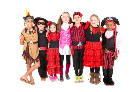 Group of kids in Halloween costumes isolated in whiteの写真素材