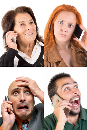 Several faces at the phone isolated in whiteの写真素材