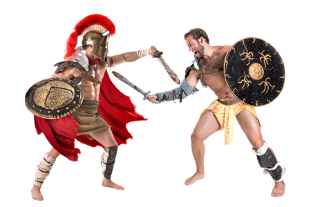 Ancient warriors or Gladiators fighting isolated in whiteの写真素材