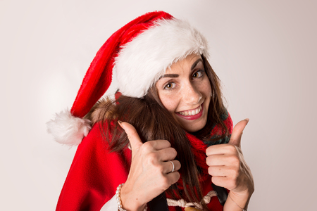 Happy and beautiful girl with freckles in Christmasの写真素材