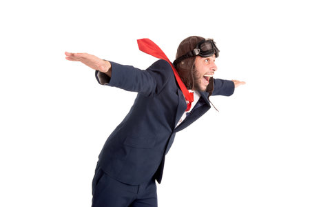 Businessman with pilot goggles isolated in a white backgroundの写真素材