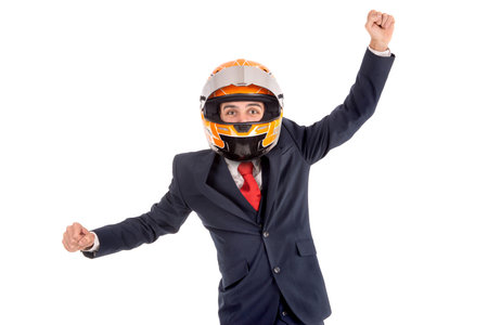 Happy and successful businessman with helmet isolated in whiteの写真素材