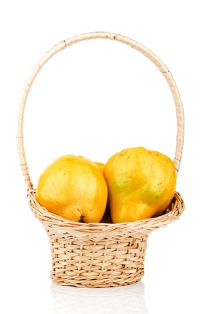 wicker basket with quincesの写真素材