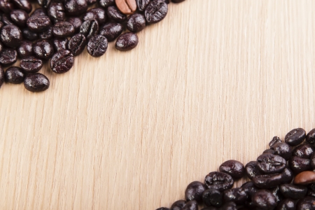 coffee beans on a wooden boardの写真素材