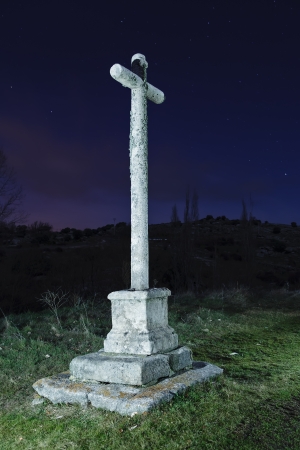 Night shot of a crucifix of graniteの写真素材