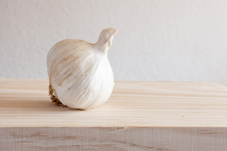 closeup of a garlic on a kitchen tableの写真素材