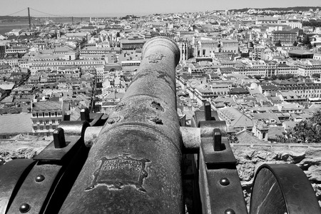 aerial view over Lisbon, Portugal, with cannon of a castleの写真素材