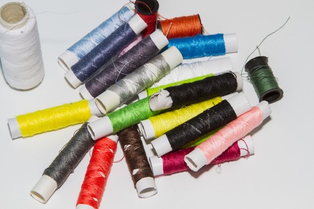 few nice colorful bobbins on white background