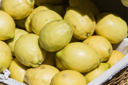 Colorful Display Of Lemons In Market