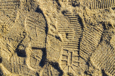 Two well-shaped human footprints in the sandの写真素材