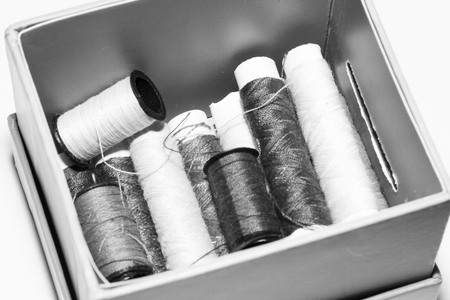 few nice colorful bobbins on white backgroundの写真素材