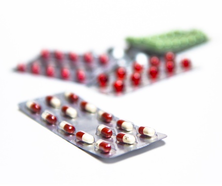 Pill tablets on isolated white background の写真素材